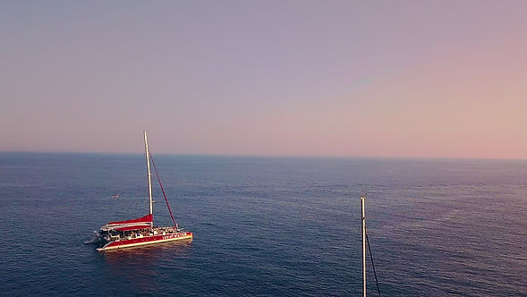 Santorini Yacht Fly Over Sunset